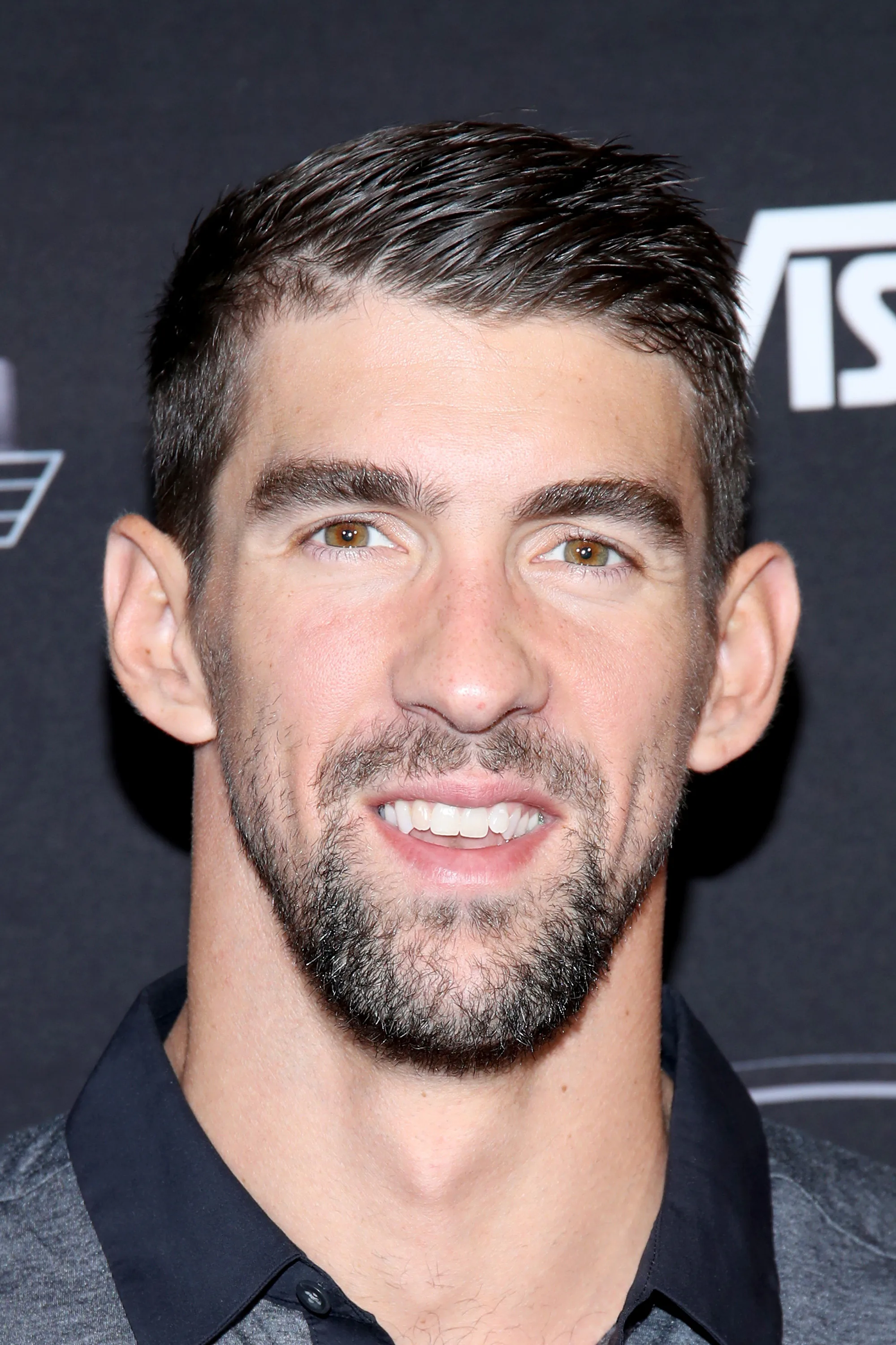 Michael Phelps Says He Has A New Dad Job After The Olympics, & It's Adorable - Romper