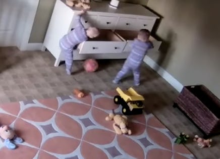 2-year-old moves fallen dresser off of twin brother 2-year-old moves fallen dresser off of twin brother