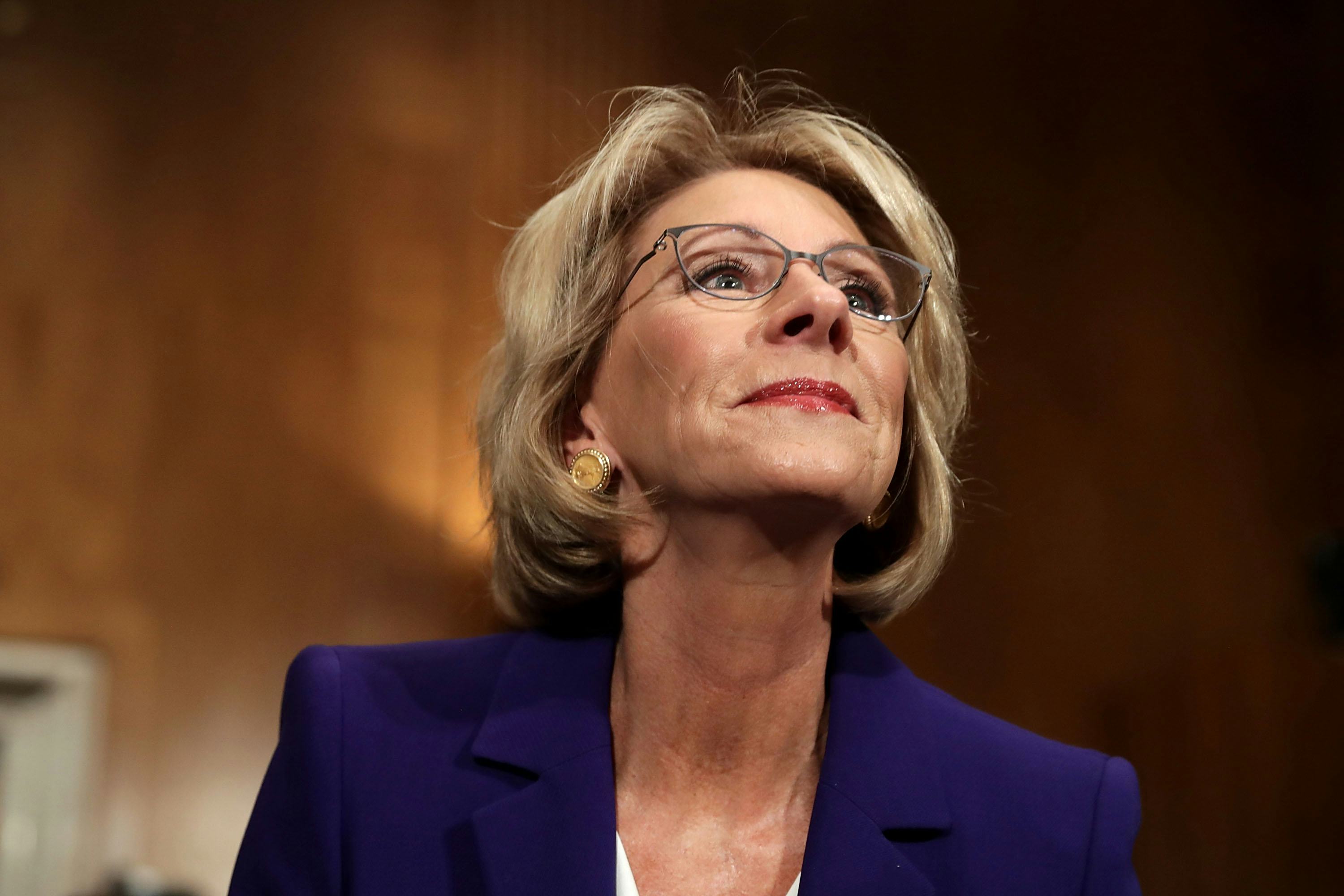 Protesters block Devos from from entering public schools