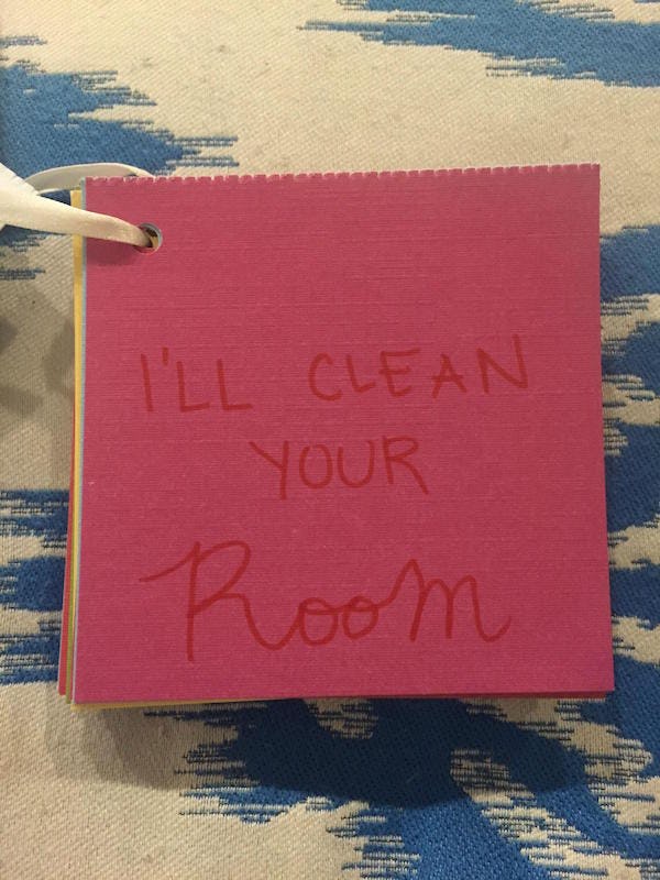 girlfriend makes dirty coupons for her boyfriend to use as he make coupons for boyfriend