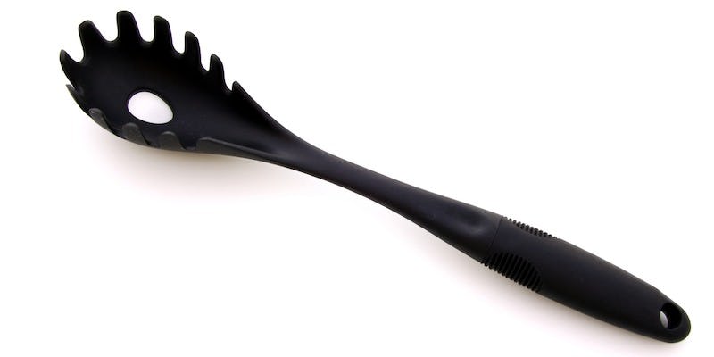 This Is The MindBlowing Reason Your Spaghetti Spoon Has A Hole In It