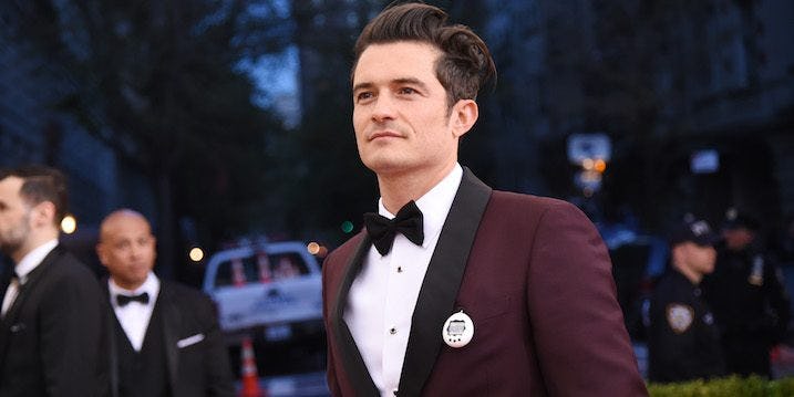 Orlando Bloom Paddle Boards With Another Woman