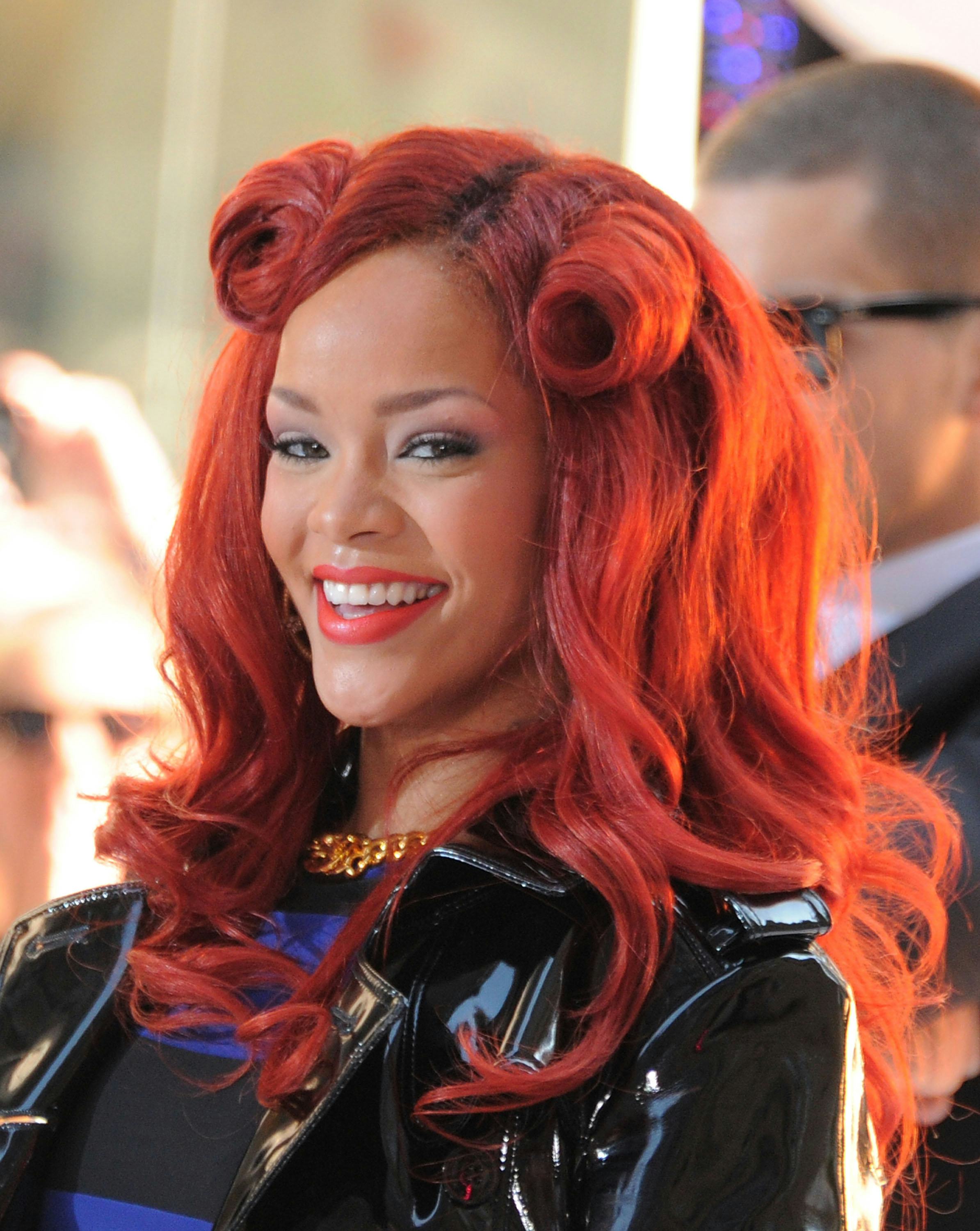 Rihanna Revisits Big Red Curls But There S A Reason She