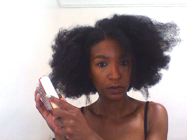 I Tried 5 Detangling Brushes On My Afro Textured Hair To Find The