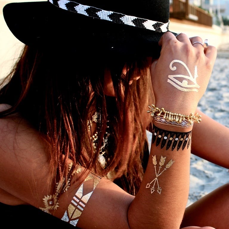 Metallic Flash Tattoos Prove Those Temporary Tats Of Your Childhood Are Officially The Next 90s Comeback Metallic Flash Tattoos Prove Those Temporary Tats Of Your Childhood Are Officially The Next 90s Comeback