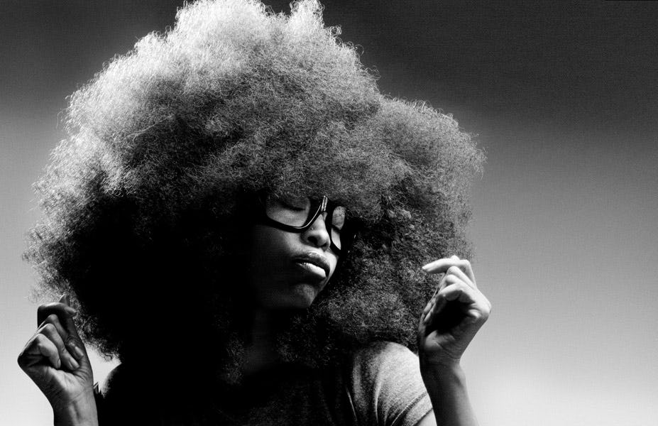 the history of natural black hair plus how 2014's afro