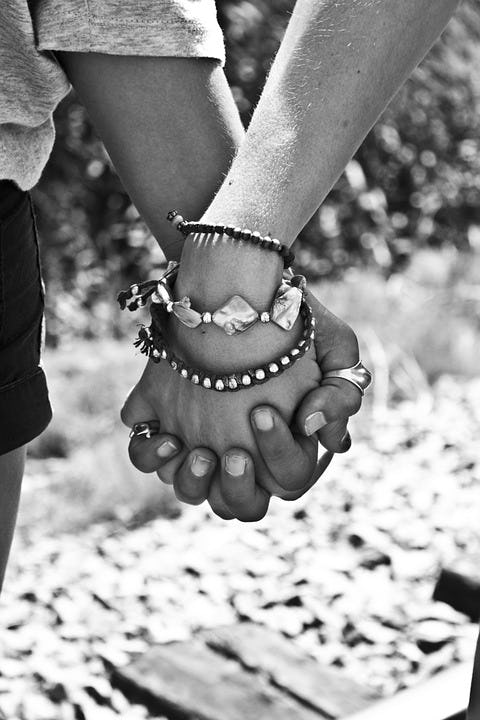 Why Do We Hold Hands? 5 Reasons, According To Science