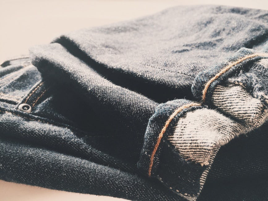 Should You Fold Or Hang Jeans? Here's The Deal When It Comes To Storing