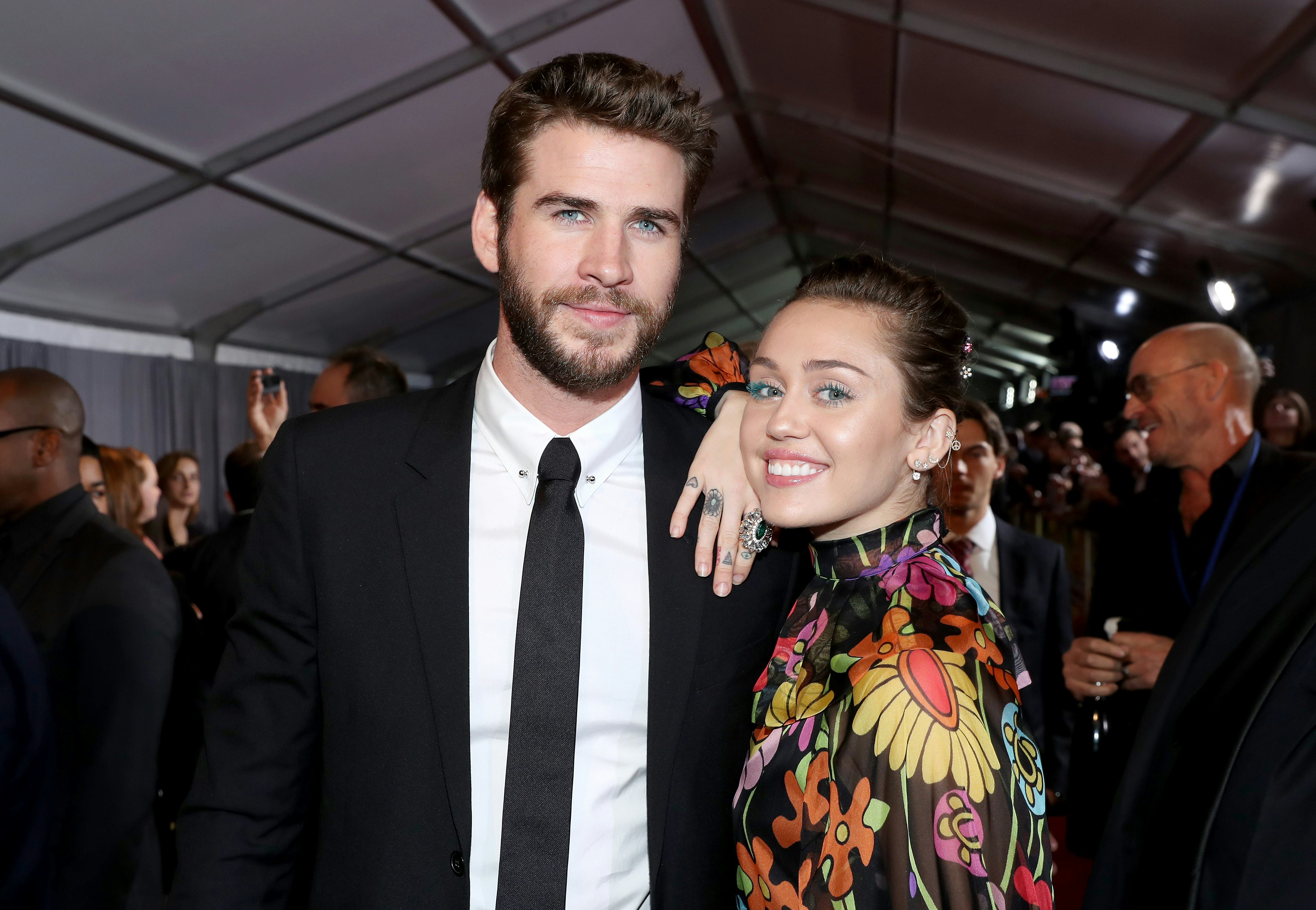 Liam Hemsworth Makes Surprise Cameo on 'SNL' With Miley Cyrus Liam Hemsworth Makes Surprise Cameo on 'SNL' With Miley Cyrus
